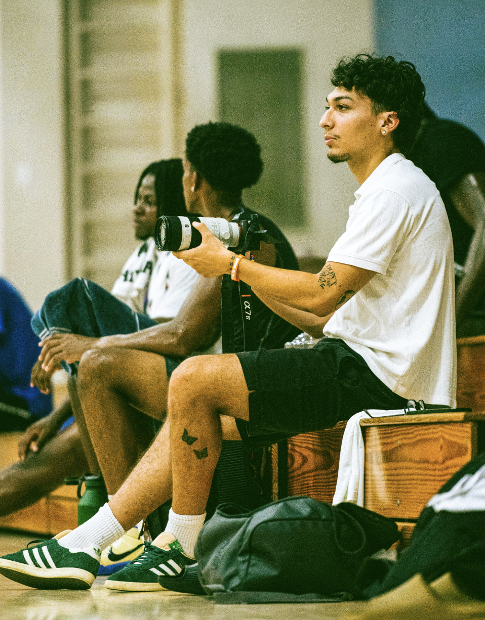 Mauricio Gallego filming at a sports event