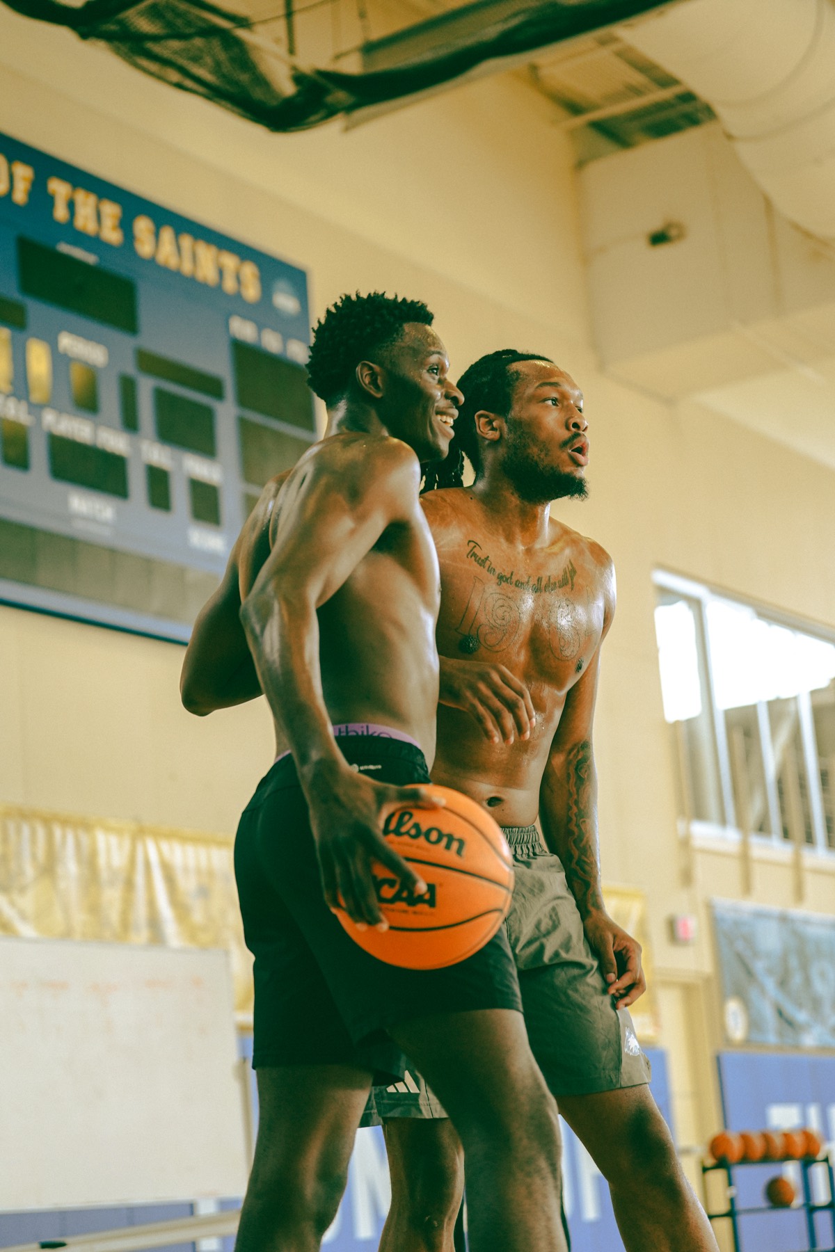 Two players waiting on the baseline during a gym session